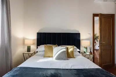 Letto o letti in una camera di Apartments Florence- Faenza Terrace