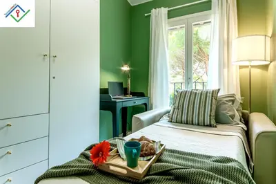 Letto o letti in una camera di Mansarda Chic con Parcheggio Privato by TuscanyWeGo