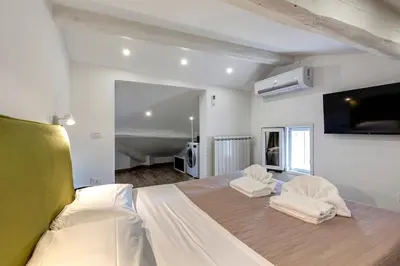 Letto o letti in una camera di Micheli Apartment