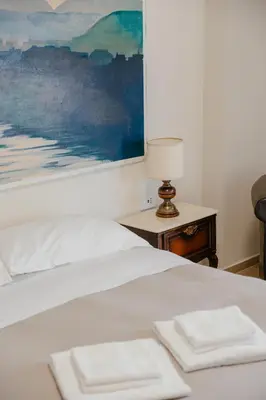 Letto o letti in una camera di Duomo - Camere matrimoniali con bagno privato