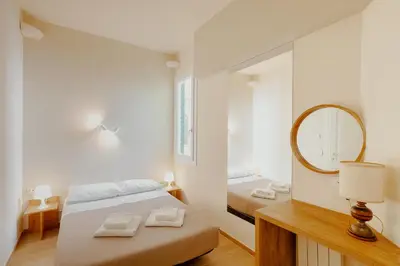 Letto o letti in una camera di Duomo - Camere matrimoniali con bagno privato