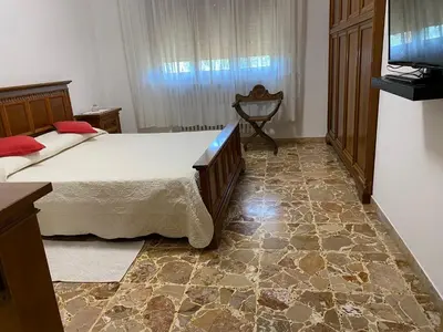 Letto o letti in una camera di BELLA VISTA BOLOGNESE