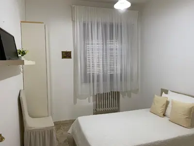 Letto o letti in una camera di BELLA VISTA BOLOGNESE