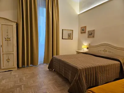 Letto o letti in una camera di Resort del Roster