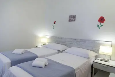 Letto o letti in una camera di Mia Palace