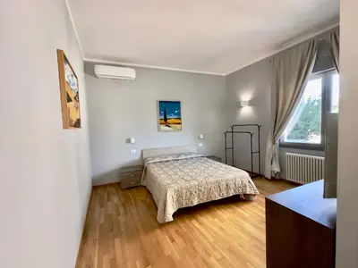 Letto o letti in una camera di Sweet Home Desiree
