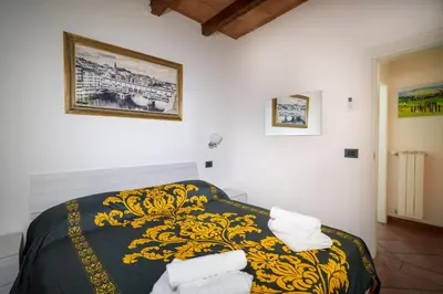 Letto o letti in una camera di Fiorino Apartment - Piazza della Libertà