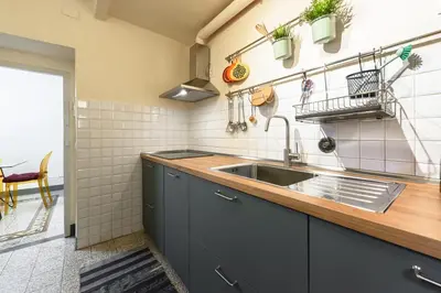 Cucina o angolo cottura di Osteria del Guanto by Mmega