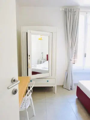 Letto o letti in una camera di Casa Macri