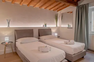 Letto o letti in una camera di Duomo Florence Apartment