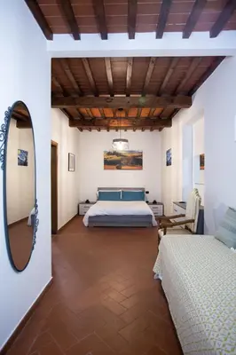 Letto o letti in una camera di YOUR APARTMENT IN FLORENCE
