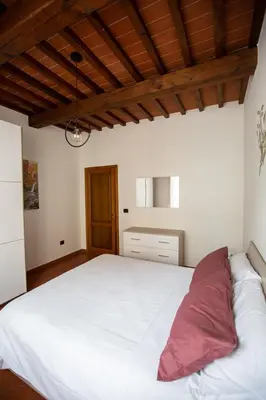 Letto o letti in una camera di YOUR APARTMENT IN FLORENCE