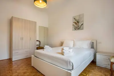 Letto o letti in una camera di Palazzo Borghese 2 Bedroom