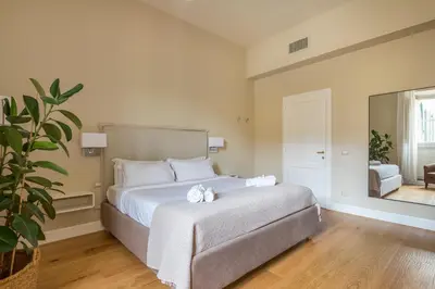 Letto o letti in una camera di Lungarno marvelous apartment with private parking
