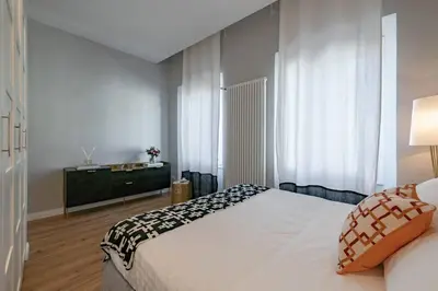 Letto o letti in una camera di Apartments Florence - Flamingo with santa croce view