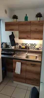 Cucina o angolo cottura di Gemme Fiorentine Apartments in front of the train station 5 minutes from the centre Free parking