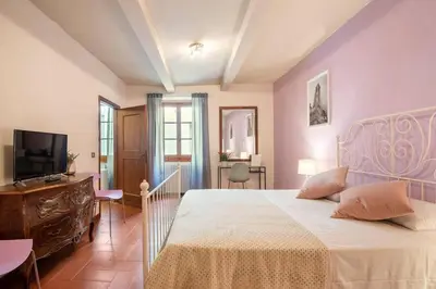 Letto o letti in una camera di Residenza degli Albizi