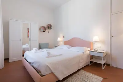 Letto o letti in una camera di Ognissanti Design by Mmega