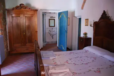 Letto o letti in una camera di Agriturismo Podere la Cava