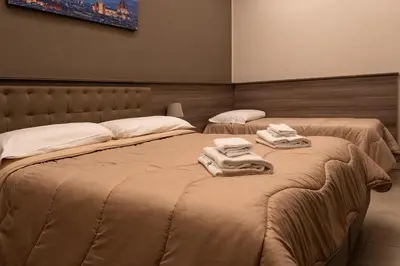 Letto o letti in una camera di La Corte di Firenze Bed and Breakfast