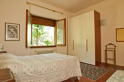 Letto o letti in una camera di Residenza Ruggini