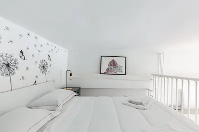 Letto o letti in una camera di GuestHost - Florence Statuto Bright and Modern Apartment
