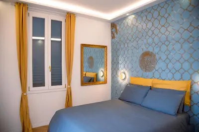 Letto o letti in una camera di Casa Michelazzi Apartment Careggi / Dalmazia