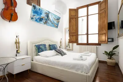 Letto o letti in una camera di Strange Uncle B&B