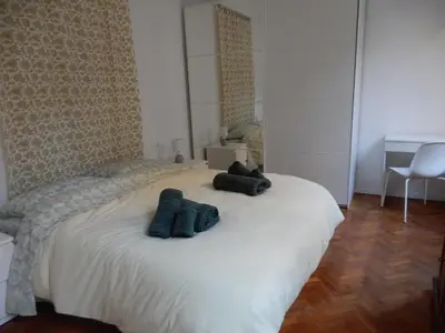 Letto o letti in una camera di Michelangelo Home