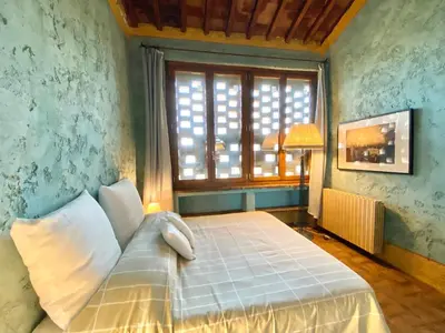 Letto o letti in una camera di Berenice in Chianti - Authentic Tuscan Country House