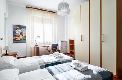 Letto o letti in una camera di GuestHost - Visarno & University Roomy Flat x6 with Parking