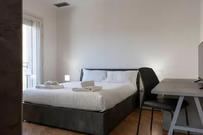Letto o letti in una camera di Angelico Modern Living