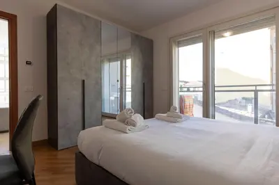 Letto o letti in una camera di Angelico Modern Living