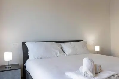 Letto o letti in una camera di Angelico Modern Living