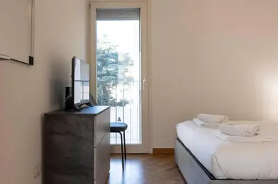 Letto o letti in una camera di Angelico Modern Living