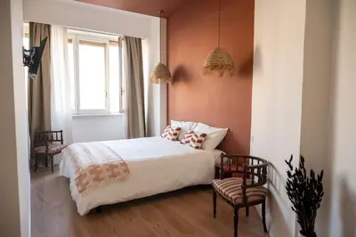 Letto o letti in una camera di Appartamento Boho chic