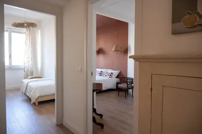 Letto o letti in una camera di Appartamento Boho chic