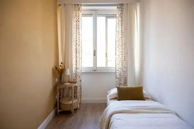 Letto o letti in una camera di Appartamento Boho chic