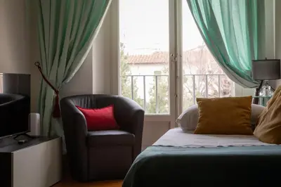 Letto o letti in una camera di Angelica House