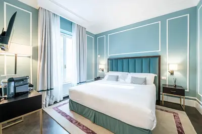 Letto o letti in una camera di Glimpse Hotel