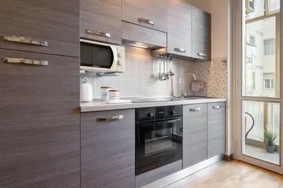 Cucina o angolo cottura di Keys of Italy - PorteNuove 18 - PN1 - Train station, one bedroom flat 2 to 4 guests