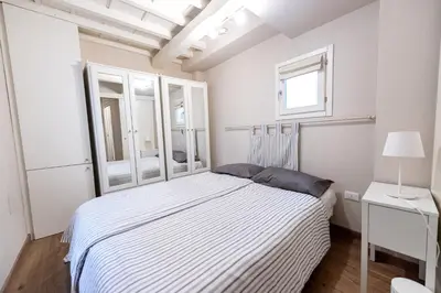 Letto o letti in una camera di Appartamento nel cuore dell'Oltrarno
