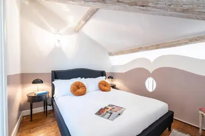 Letto o letti in una camera di Genteel Home Scarlatti