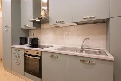 Cucina o angolo cottura di Mercato Contemporary Apartment by Mmega