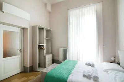 Letto o letti in una camera di Buonarroti Boutique Apartment
