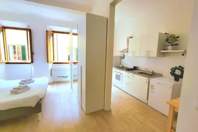 Letto o letti in una camera di Macci Florence Sweet Apartment