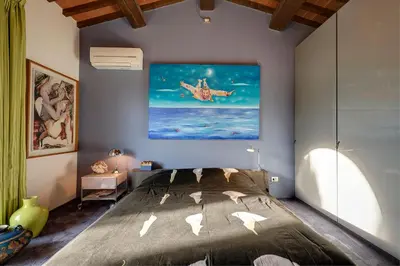 Letto o letti in una camera di LE MASSE - LOFT