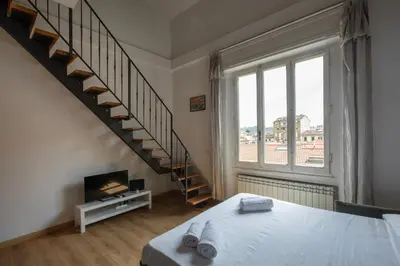 Letto o letti in una camera di Scarlatti - Boutique Home in Florence