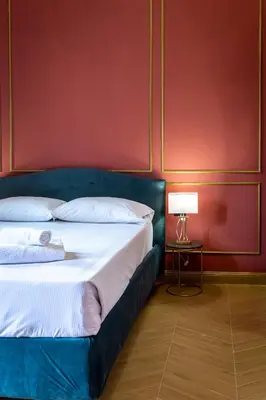Letto o letti in una camera di Residenza d'Epoca White Room