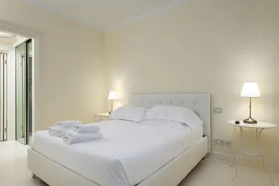 Letto o letti in una camera di UNYCA - Florence Elegant Residence